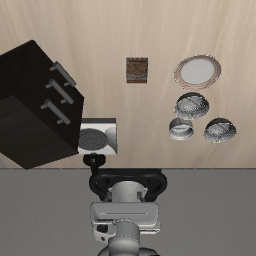 A trained SmolVLA policy picking up a bowl and placing it on a plate in the LIBERO simulator.